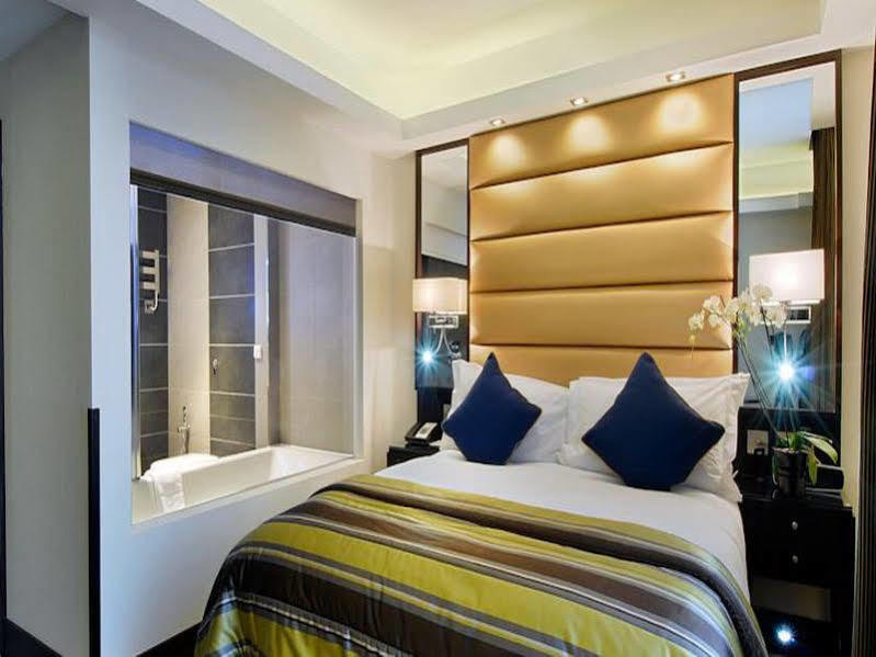 Park Grand Mayfair Лондон Екстериор снимка A bedroom at the hotel